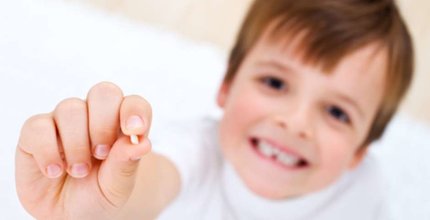 Por que você deveria guardar os dentes de leite do seu filho?
